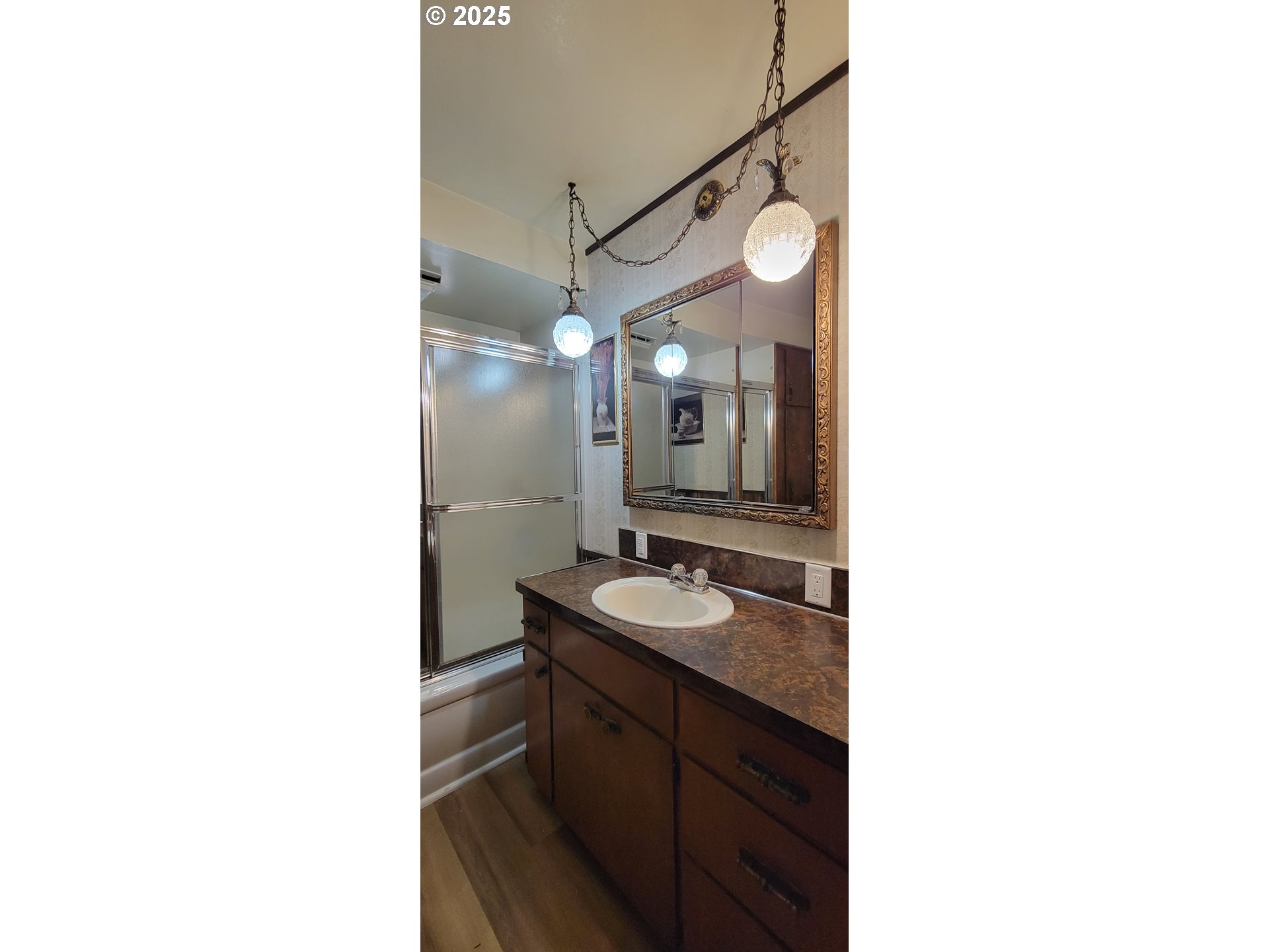 76376 River Road Oakridge, OR 97463 - Photo 18 of 38 a bathroom with a sink and a mirror