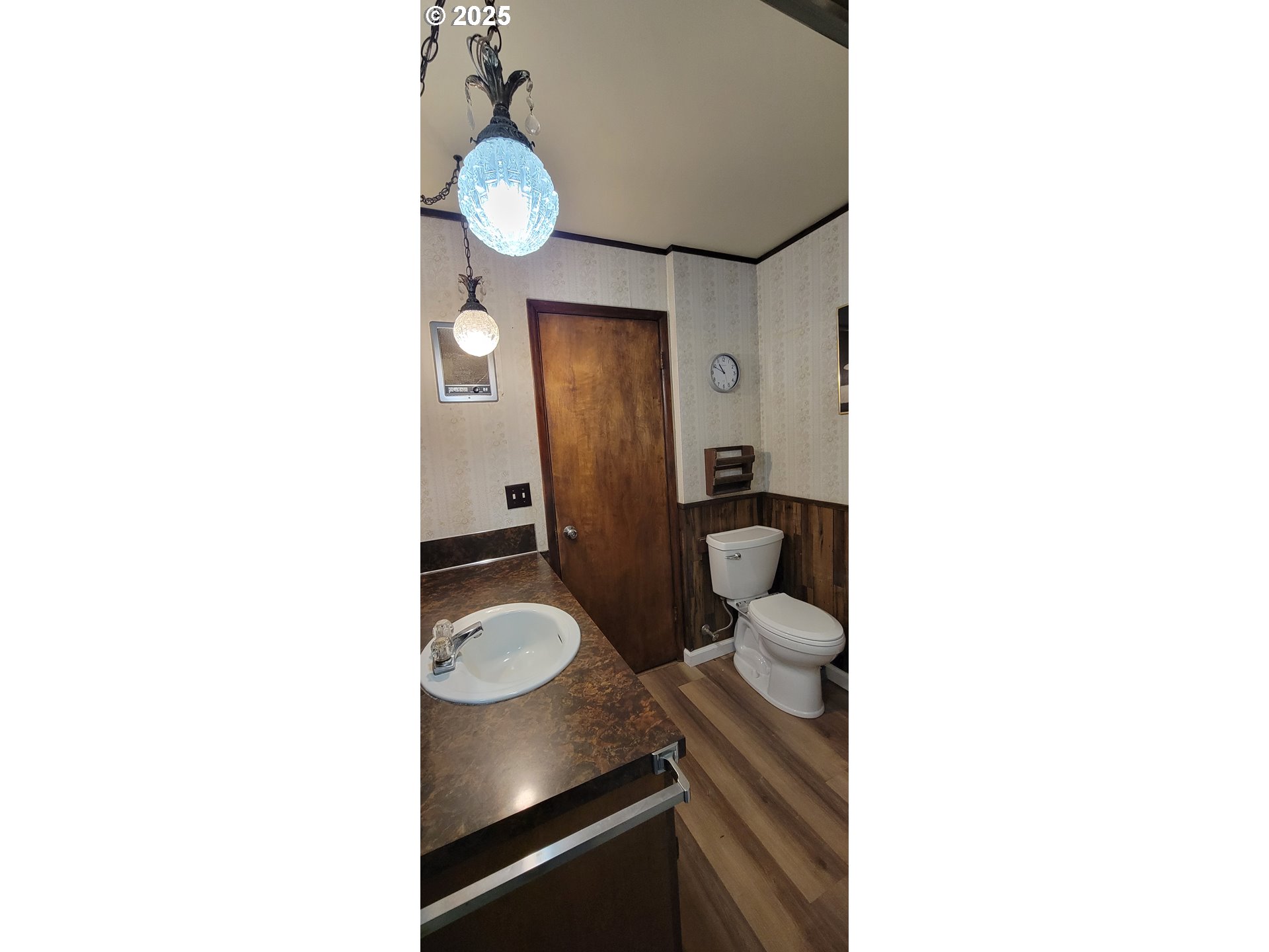 76376 River Road Oakridge, OR 97463 - Photo 20 of 38 a bathroom with a toilet and a mirror