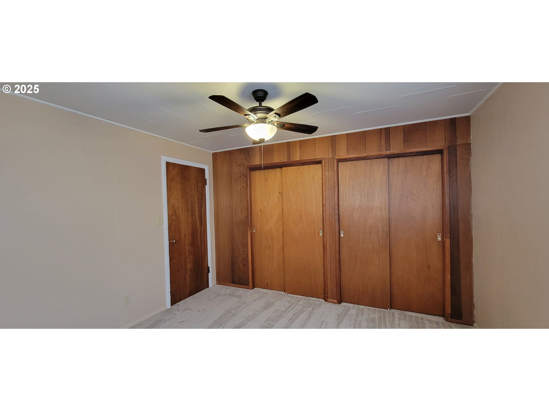 76376 River Road Oakridge, OR 97463 - Photo 24 of 38 a black and white kitchen with wooden floor