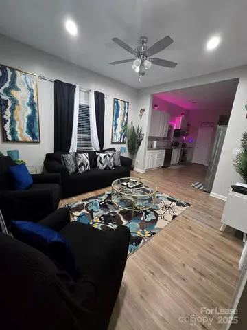 a bed room with furniture and window