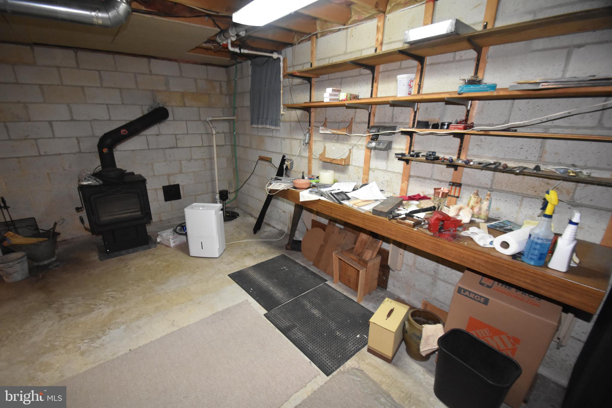 1175 Dutch Neck Road Middletown, DE 19709 - Photo 40 of 55 Wood Stove Heater near workshop area