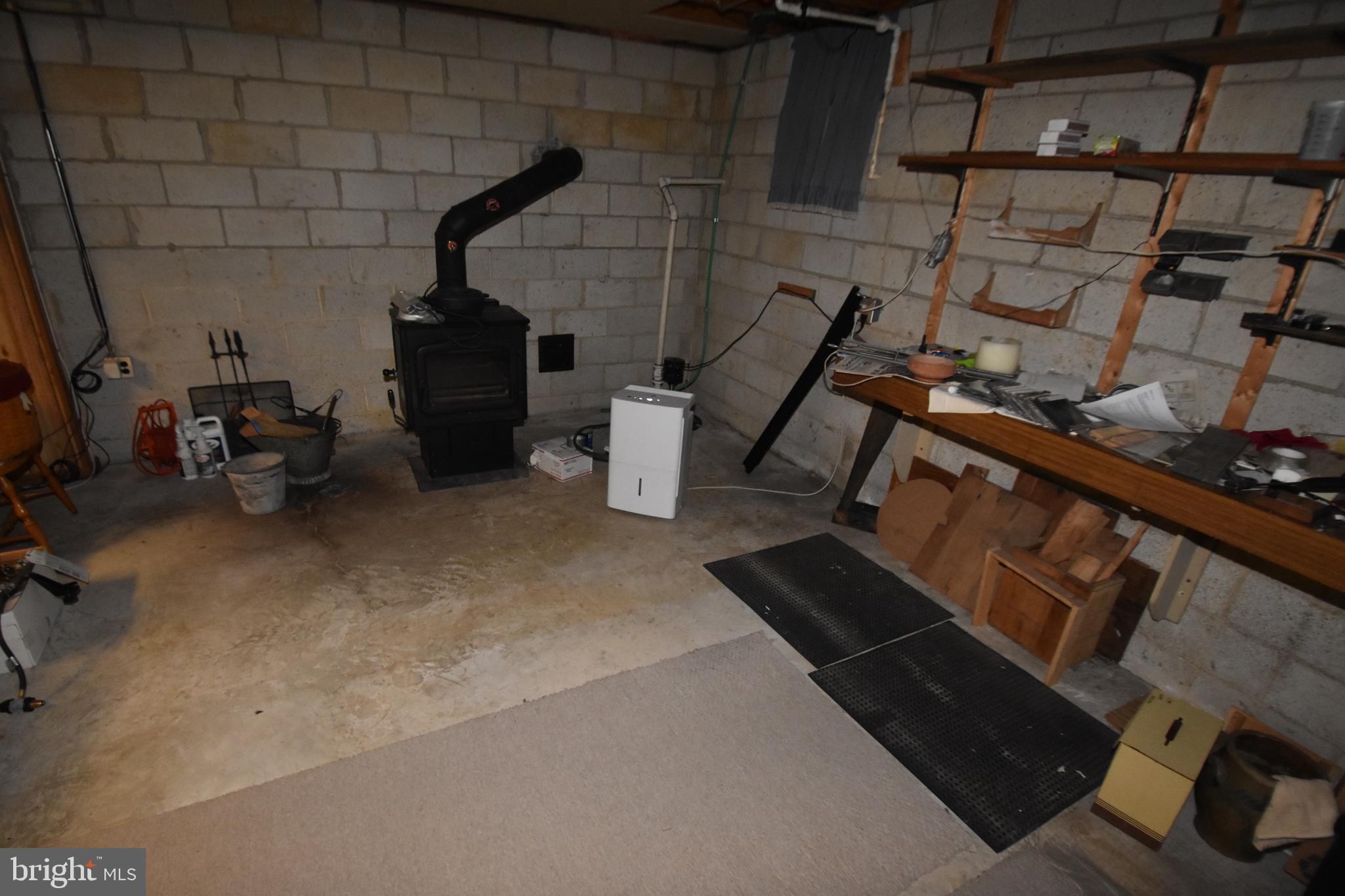 1175 Dutch Neck Road Middletown, DE 19709 - Photo 51 of 55 Wood Stove Heater near workshop area
