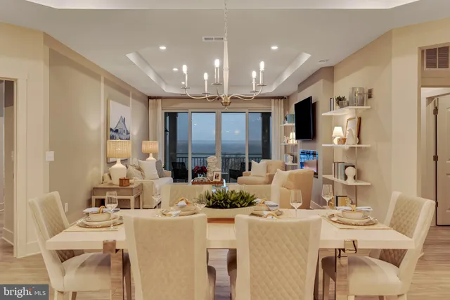a living room with fireplace furniture and a flat screen tv