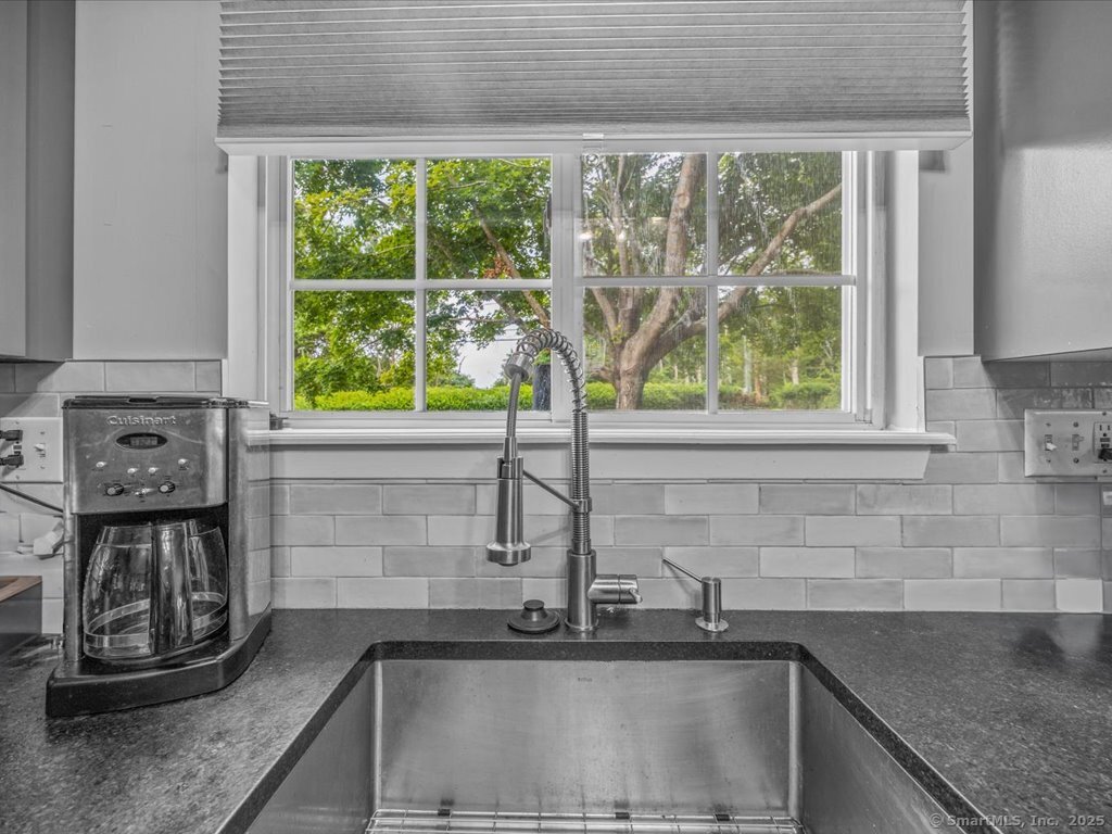 3 Apple Way Madison, CT 06443 - Photo 13 of 31 a kitchen with a sink a counter top and a window