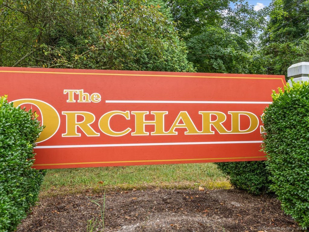 3 Apple Way Madison, CT 06443 - Photo 28 of 31 a sign that is on the wall of a building