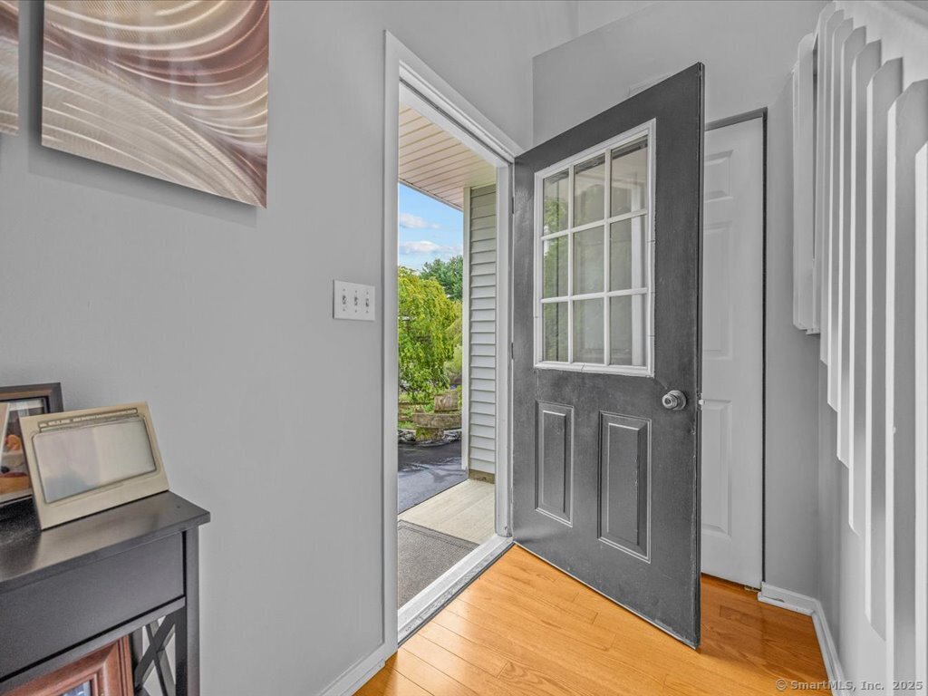 3 Apple Way Madison, CT 06443 - Photo 3 of 31 a view of an empty room and bathroom