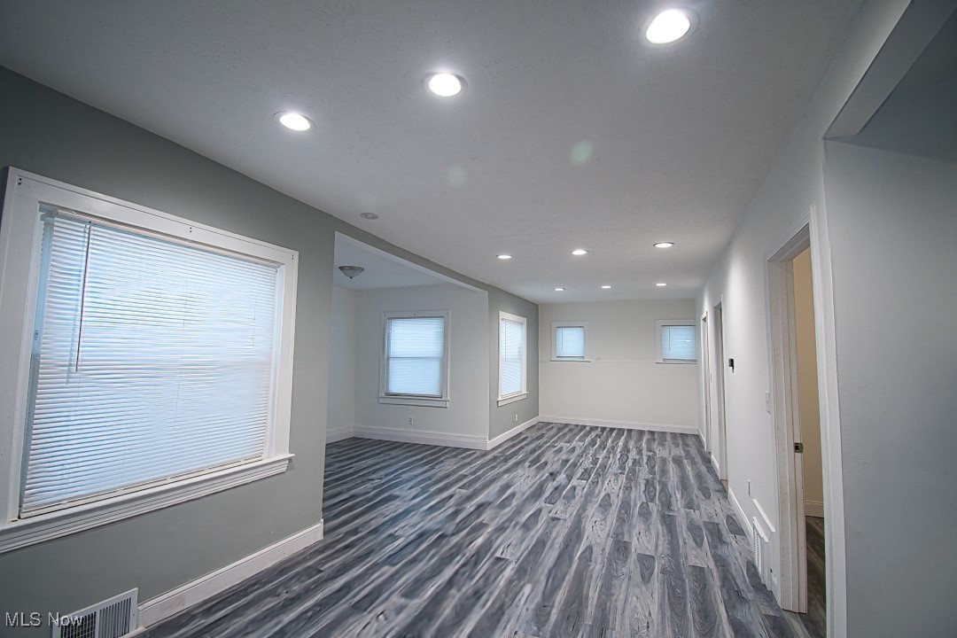 5402 Biddulph Road Cleveland, OH 44144 - Photo 6 of 20 Unfurnished room featuring dark hardwood / wood-style flooring