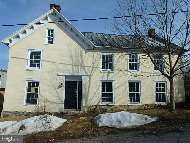 4265 Main Street Rohrersville, MD 21779 - Photo 1 of 19 a front view of a house with a yard