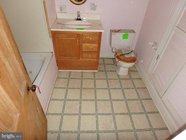 4265 Main Street Rohrersville, MD 21779 - Photo 14 of 19 a bathroom with a sink and toilet