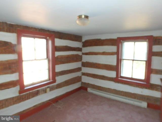 4265 Main Street Rohrersville, MD 21779 - Photo 15 of 19 a view of empty room with wooden floor and fan