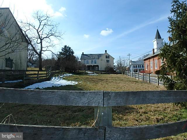 4265 Main Street Rohrersville, MD 21779 - Photo 18 of 19 a view of a house with a yard