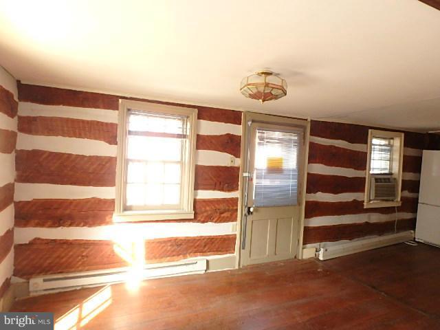 4265 Main Street Rohrersville, MD 21779 - Photo 5 of 19 a view of an empty room with a window