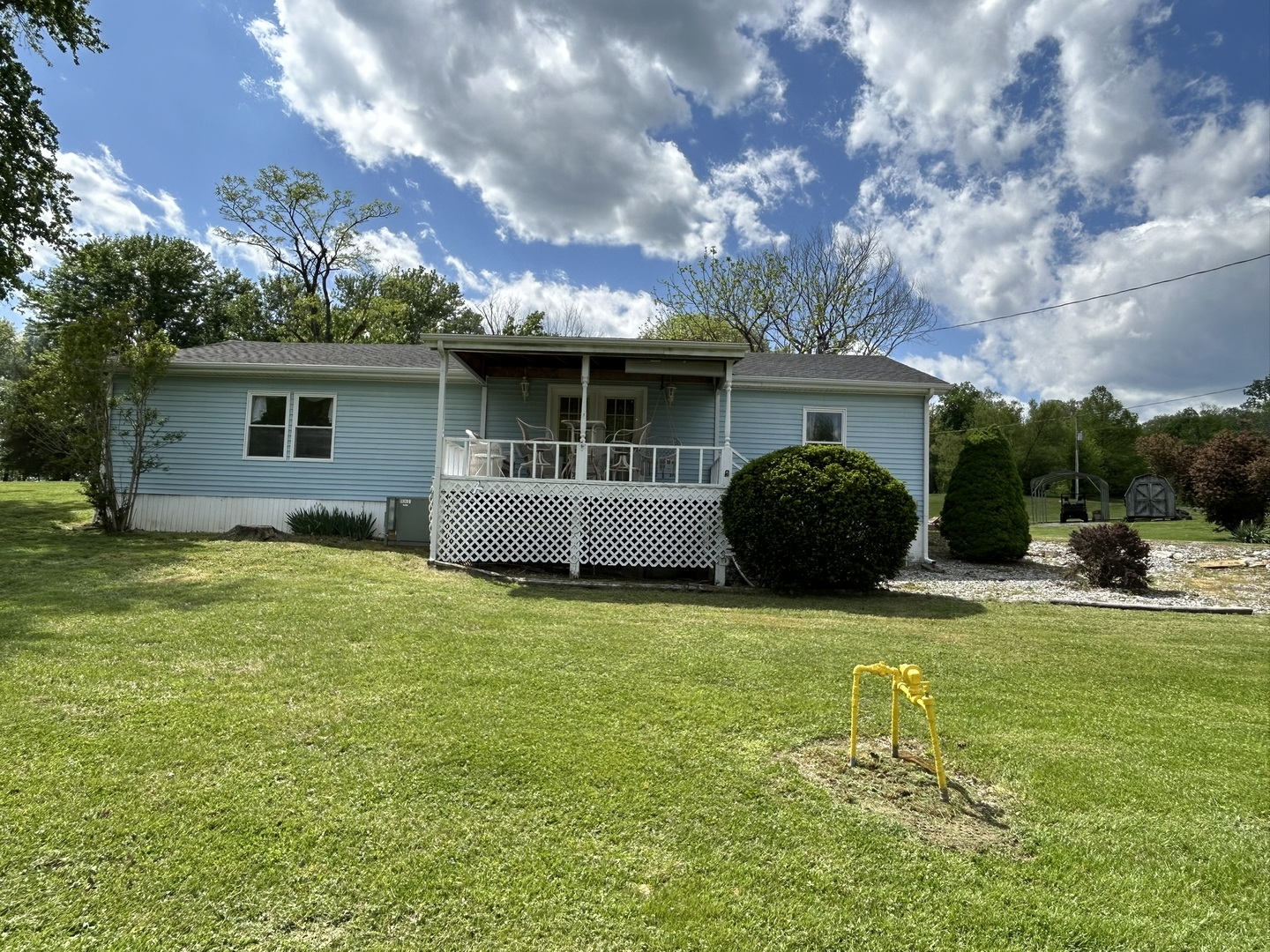 1 Bushwack Road Golconda, IL 62938 - Photo 2 of 38 a view of a house with a backyard and a tree