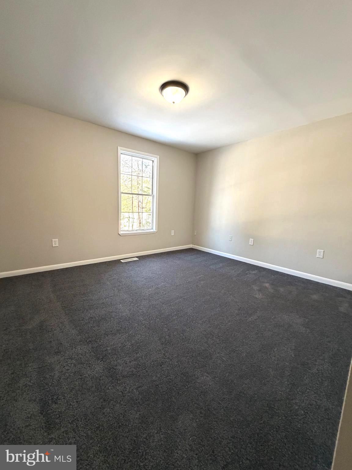 12926 Couples Place Waldorf, MD 20601 - Photo 19 of 29 an empty room with a window