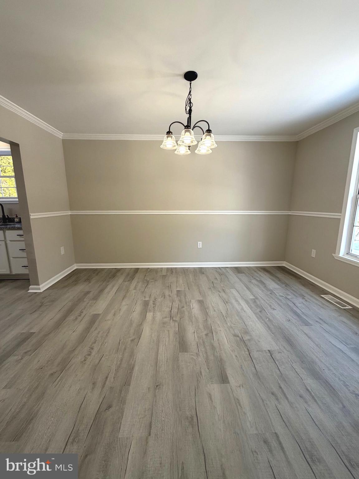 12926 Couples Place Waldorf, MD 20601 - Photo 8 of 29 a view of empty room with wooden floor