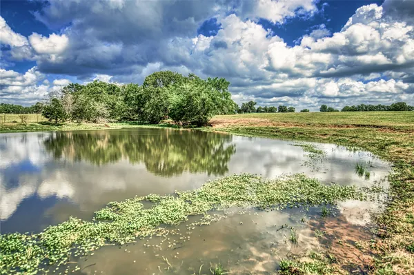 a living room with furniture fireplace and a fireplace