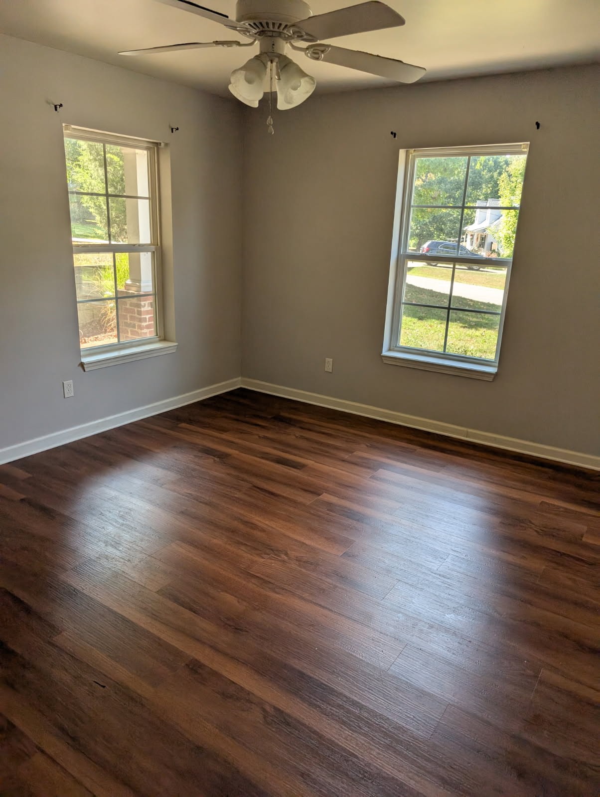 119 Silver Leaf Circle Dickson, TN 37055 - Photo 7 of 14 a view of an empty room with wooden floor and a window