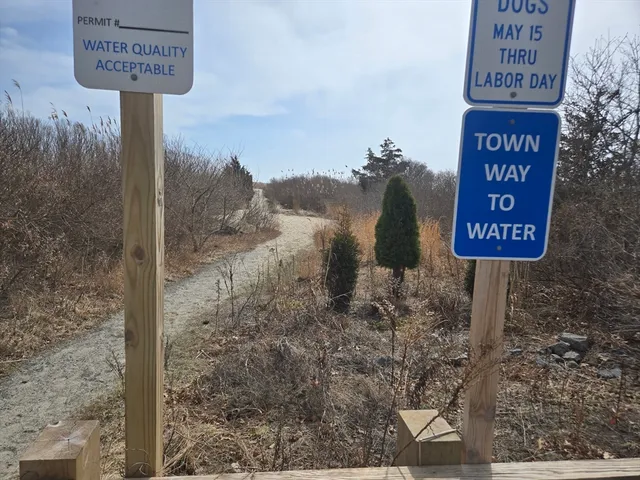 a sign broad on the side of a road