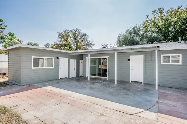 a front view of a house with yard