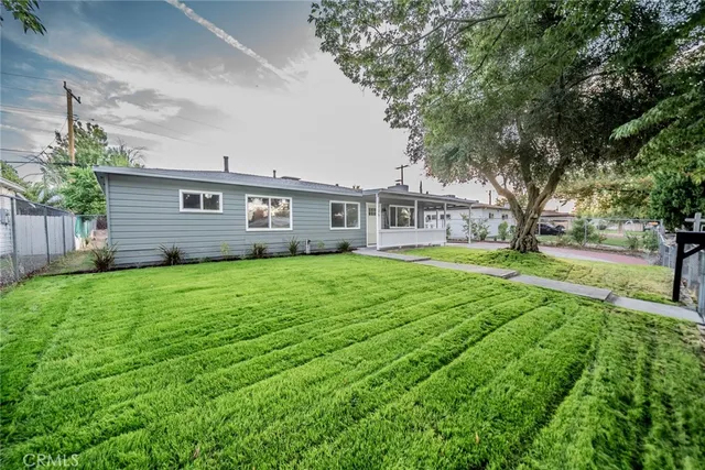a house view with a garden space