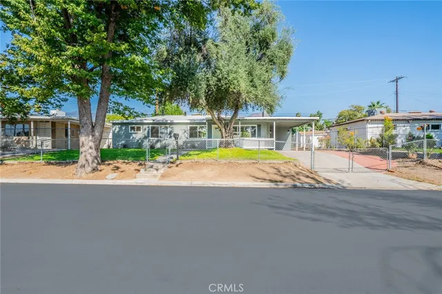 a view of a house with a swimming pool
