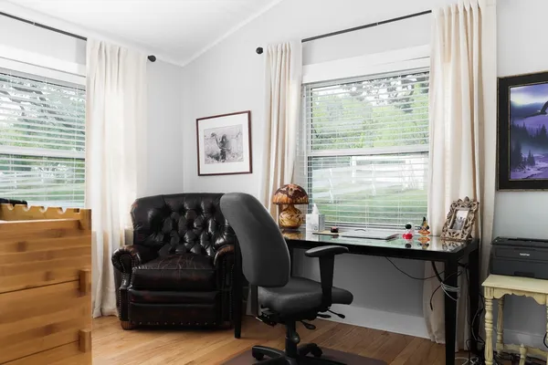 a room with furniture and a window