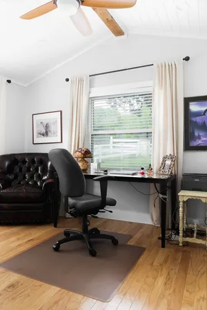 a room with chess table table tennis pool table and a window