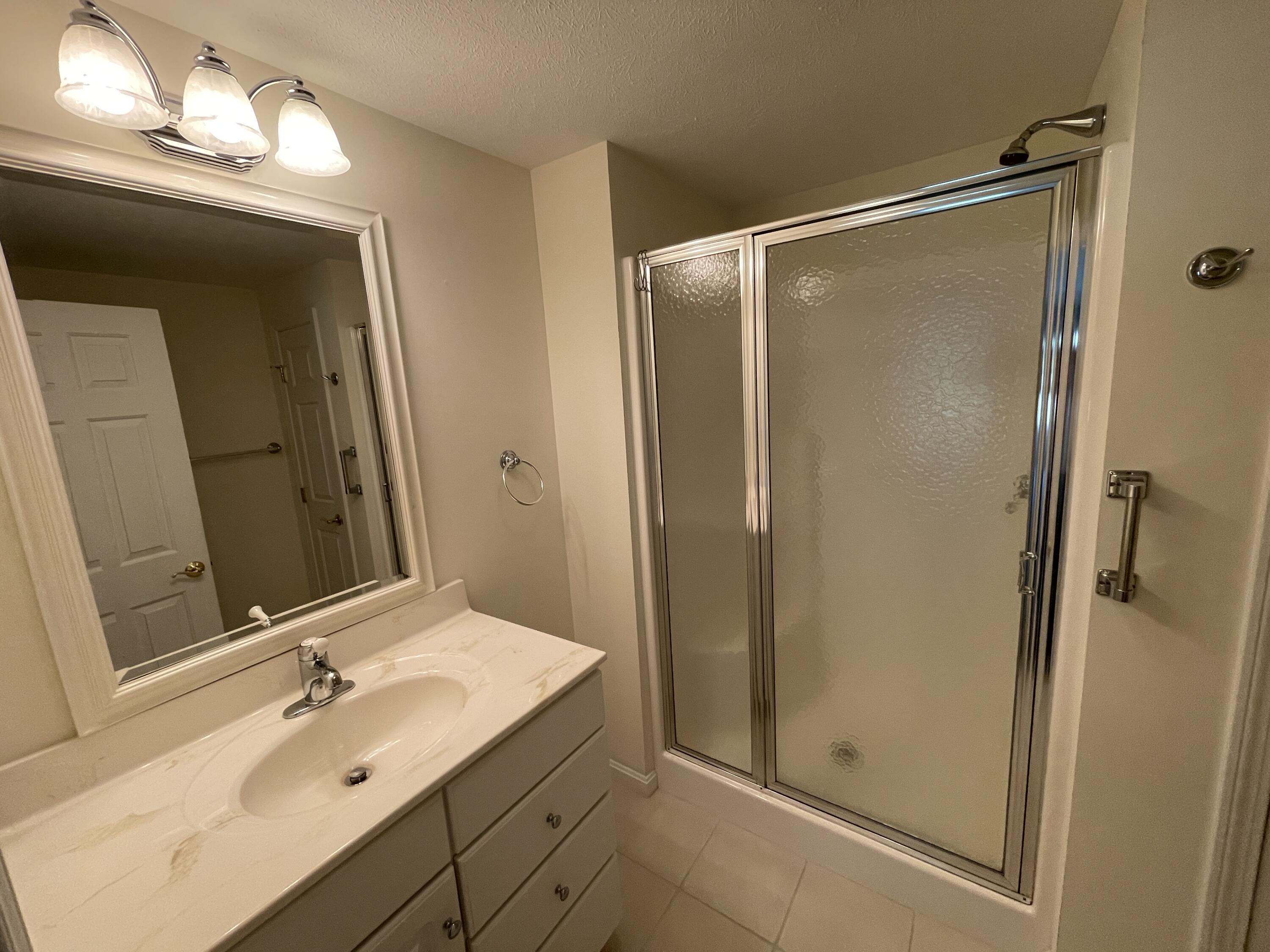 20 Ridgefield Drive, Unit 16 Gorham, ME 04038 - Photo 15 of 27 Primary Suite Bathroom
