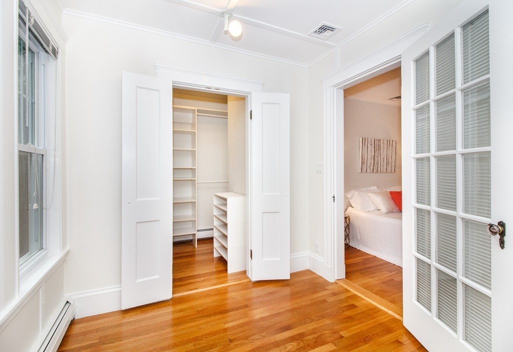 55 Wilde Road Newton, MA 02468 - Photo 23 of 30 a bedroom with a bed and a window