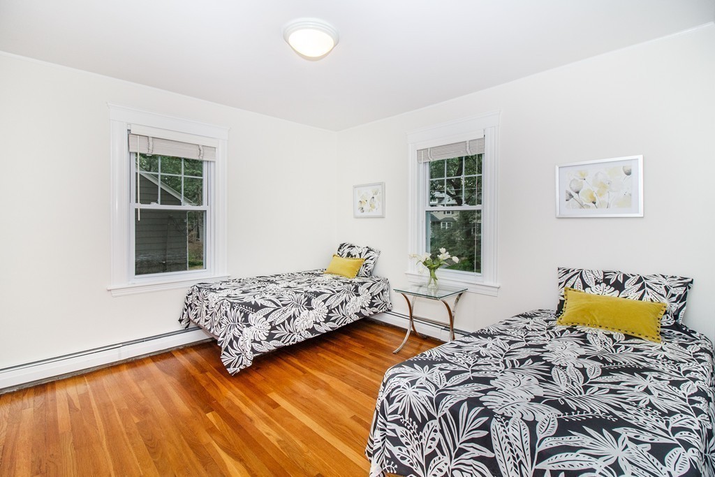 55 Wilde Road Newton, MA 02468 - Photo 25 of 30 a bedroom with two beds and a window