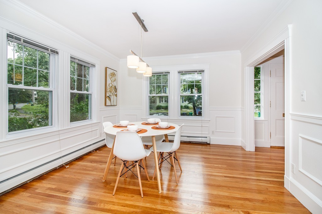 55 Wilde Road Newton, MA 02468 - Photo 4 of 30 a view of a dining room with furniture window and wooden floor