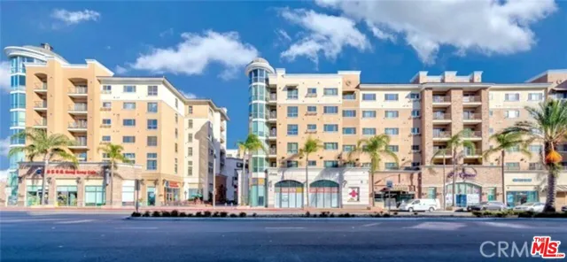 a view of a building with a street