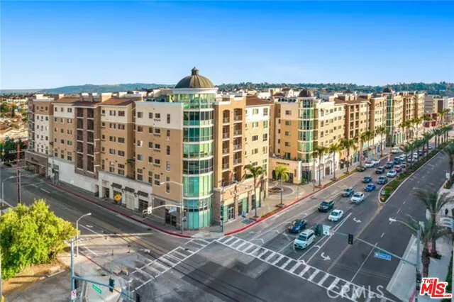 a view of a city with tall buildings