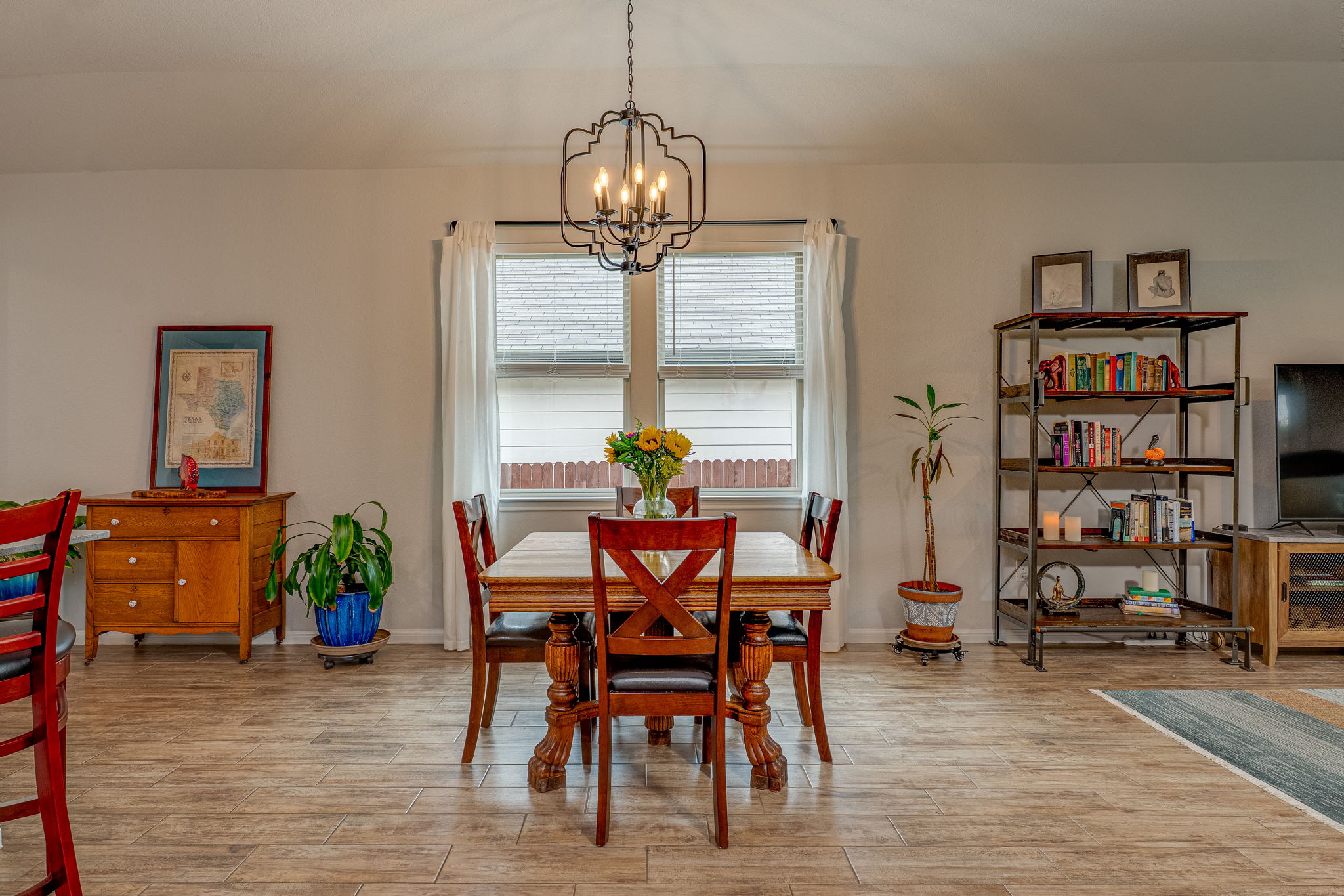 1009 Goldilocks Lane Manchaca, TX 78652 - Photo 11 of 40 Dining area featuring wood-look tile flooring.