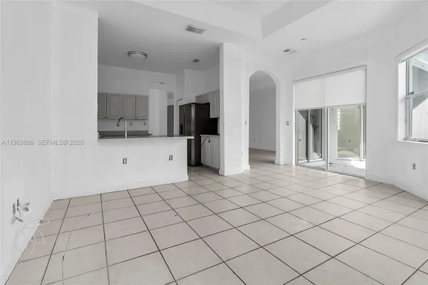 a view of an empty room and window