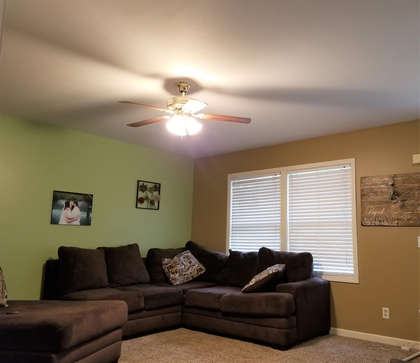 3312 Friendship Road Cross Plains, TN 37049 - Photo 5 of 11 a living room with furniture and a window