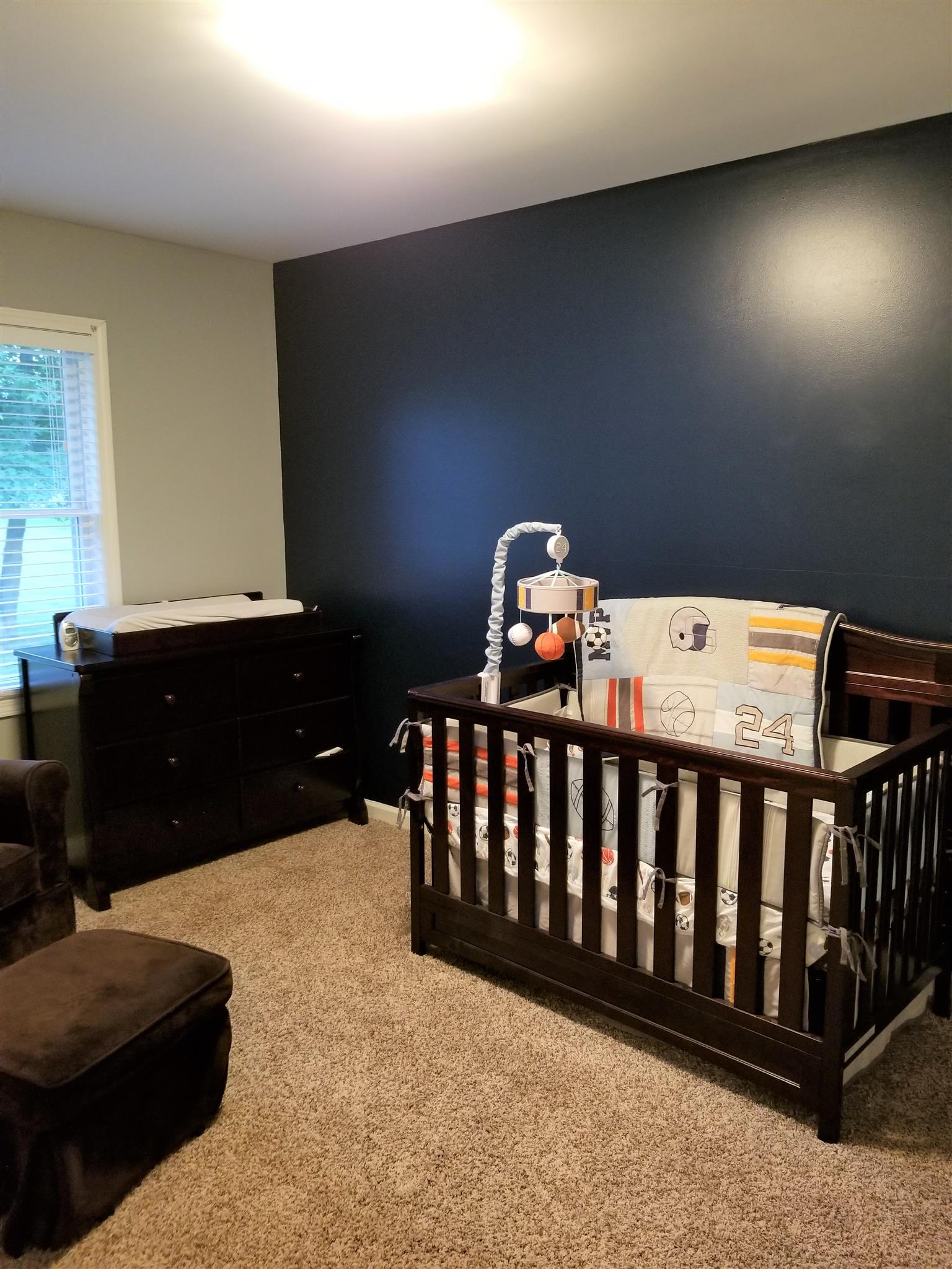 3312 Friendship Road Cross Plains, TN 37049 - Photo 9 of 11 a bedroom with a bed and window