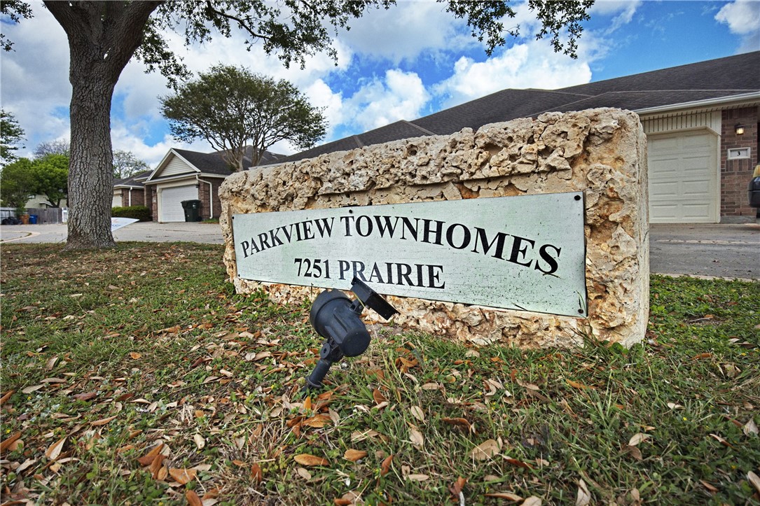 7251 Prairie Drive, Unit 6 Corpus Christi, TX 78413 - Photo 3 of 28 a sign broad in front of a white house