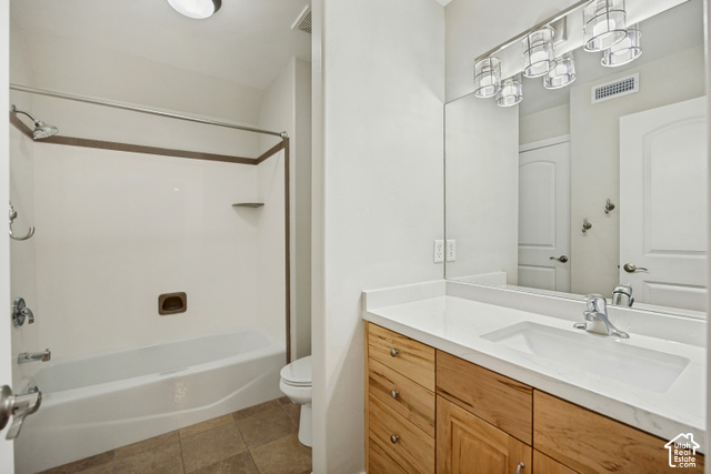 259 Twin River Loop Alpine, UT 84004 - Photo 27 of 61 The other side of the Jack & Jill bathroom nestled between 2 bedrooms and a large playroom with wood-finish cabinetry, a large integrated sink, and an expansive wall-mounted mirror
