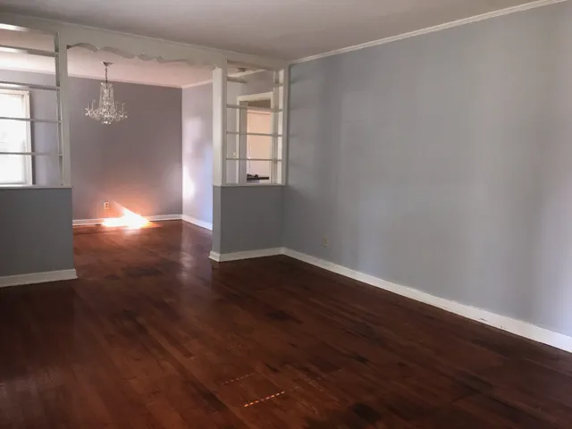 a view of livingroom with hardwood floor and window