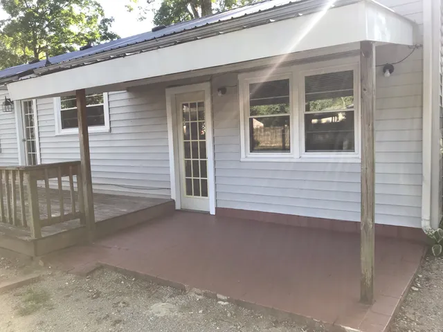 a view of a house with a street