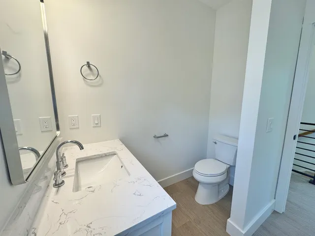 a bathroom with a sink and toilet