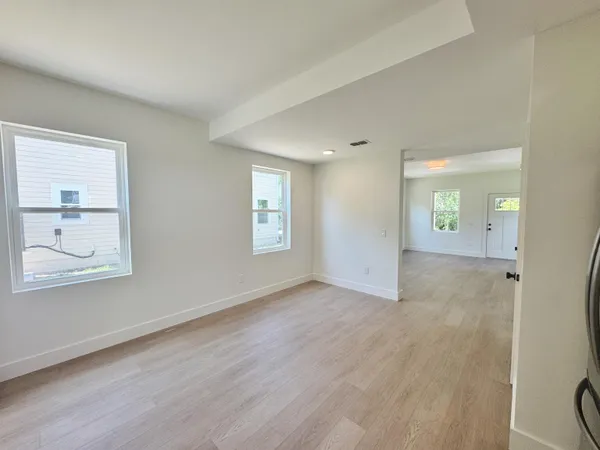an empty room with windows
