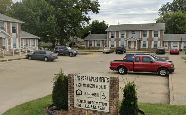 a view of a car parked in front of a house