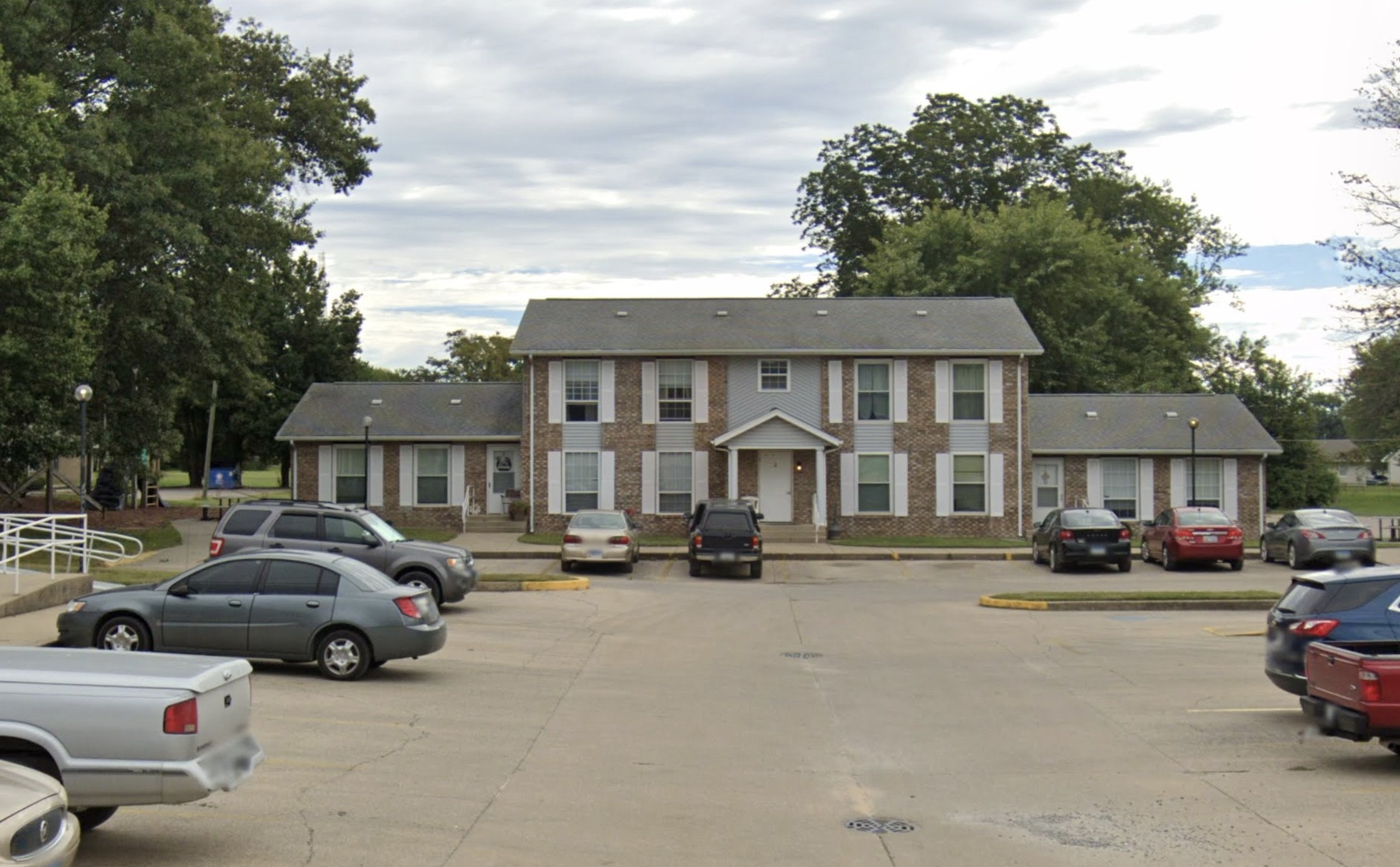 203 North Division Street Mount Carmel, IL 62863 - Photo 2 of 8 a car parked in front of a white house