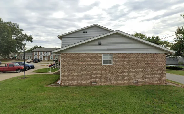 a view of empty room with windows