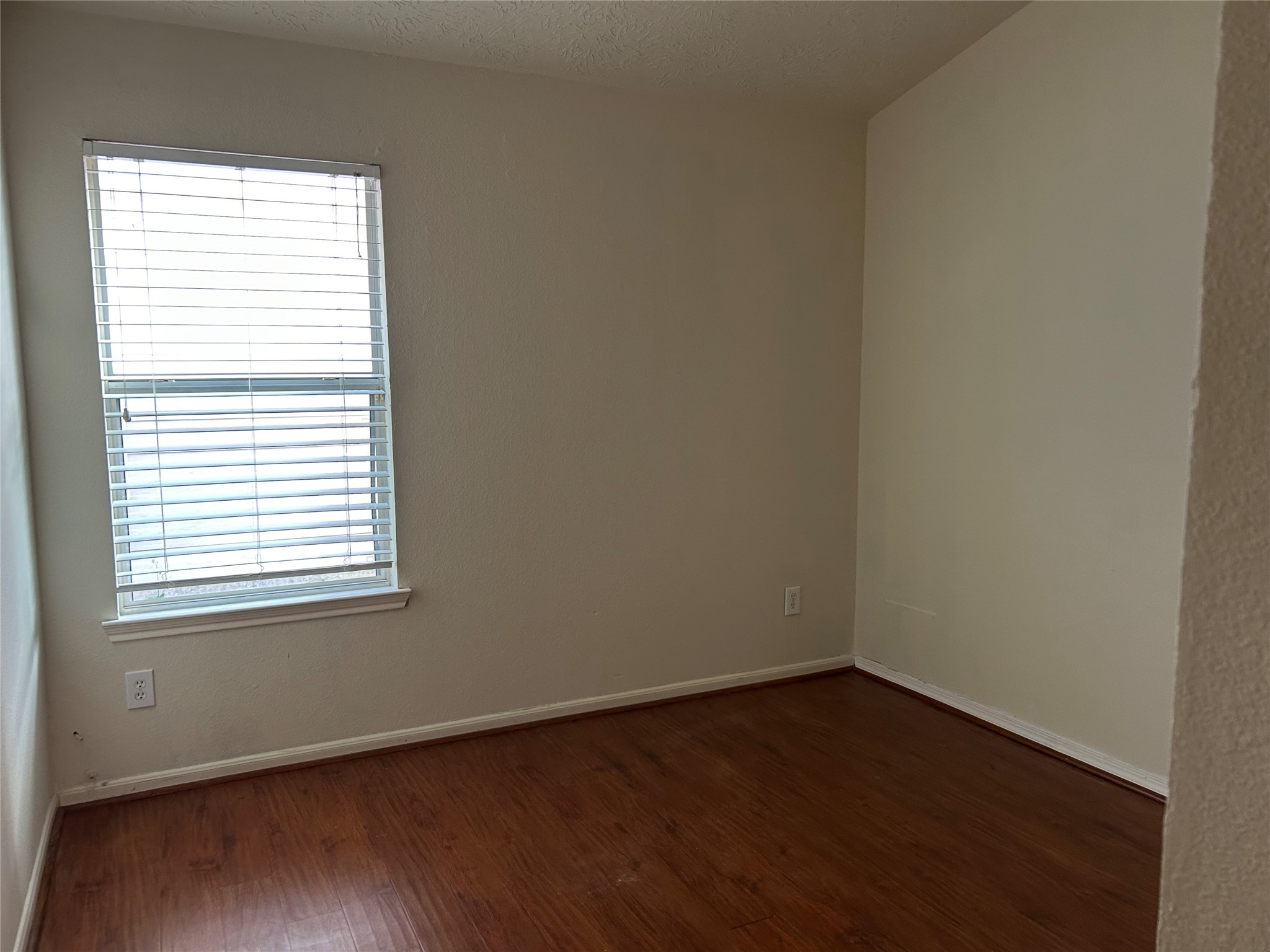 11635 Alpine Vale Court Houston, TX 77038 - Photo 15 of 18 an empty room with a window