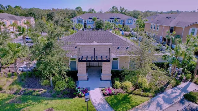 a view of a house with a garden