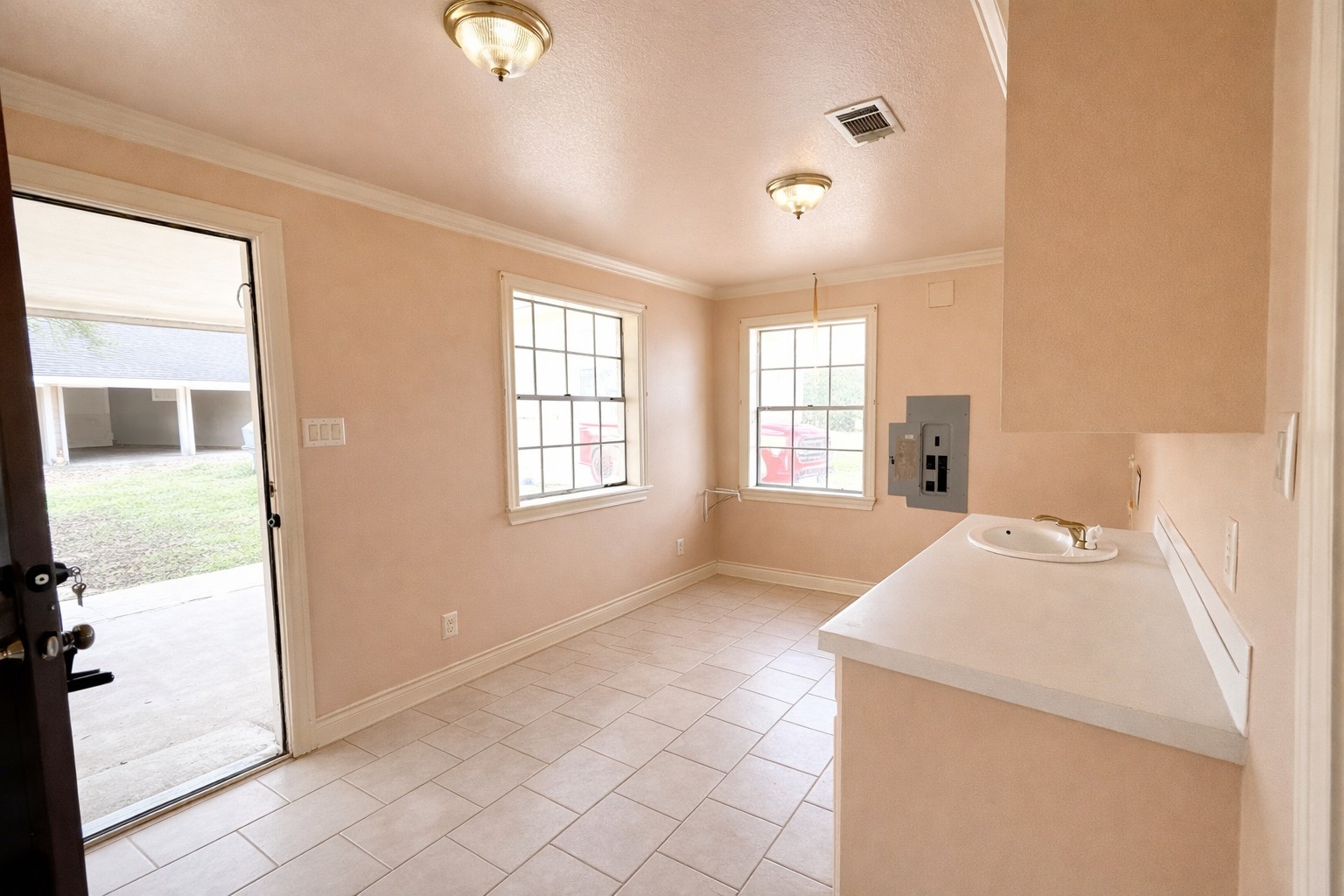 15696 Westgate Road Splendora, TX 77372 - Photo 4 of 17 Utility Room with fresh paint and deep clean via AI