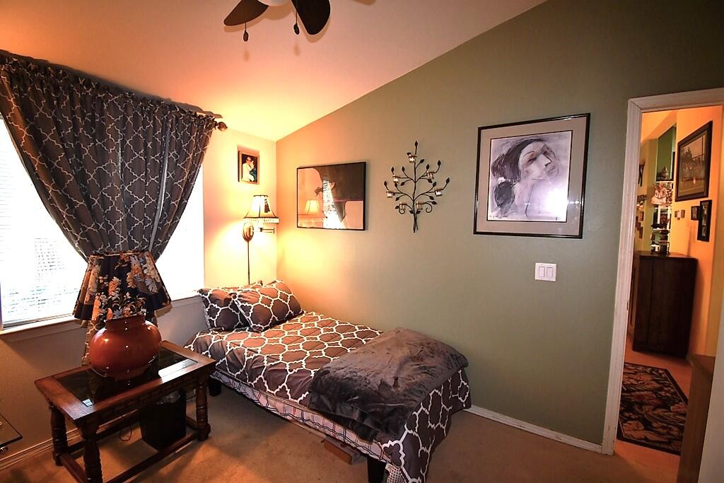 29077 Day Road McArthur, CA 96056 - Photo 29 of 58 a bedroom with a bed and a flat screen tv